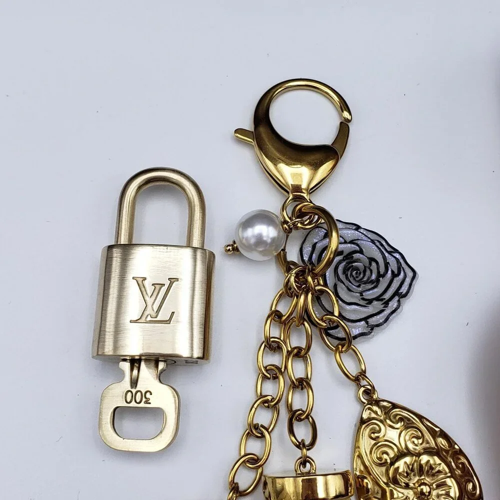 Authentic Louis Vuitton Luggage Nametag and Gold Padlock with Unbranded Keycharm